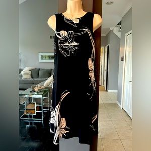 ANNE KLEIN - Black w/White Floral Asymmetrical Sleeveless Dress. Size 6